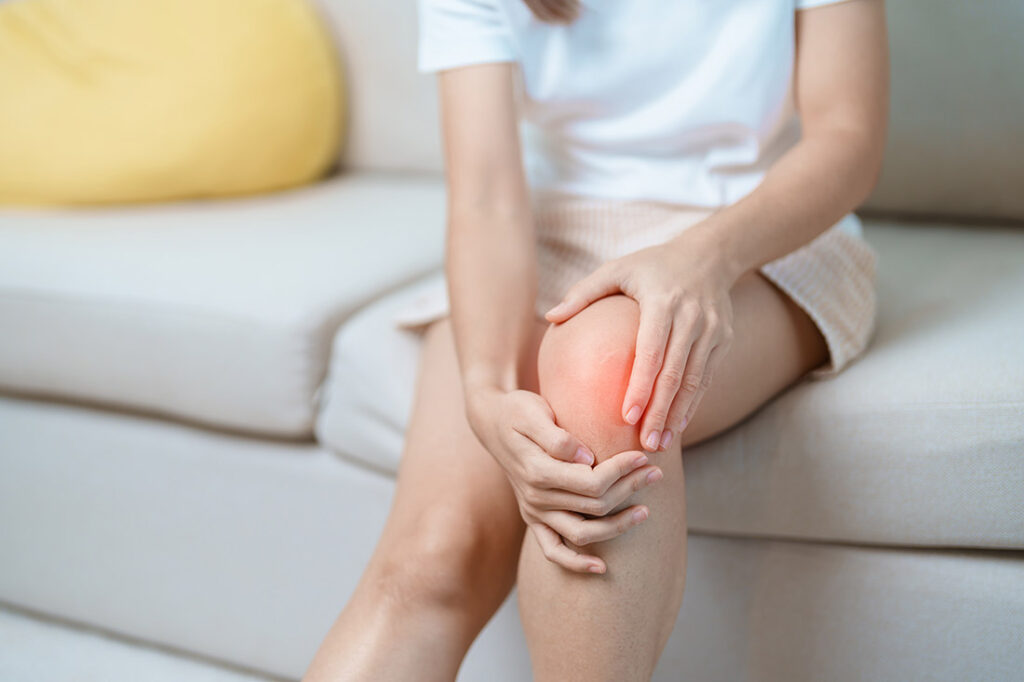 A woman struggling with joint inflammation