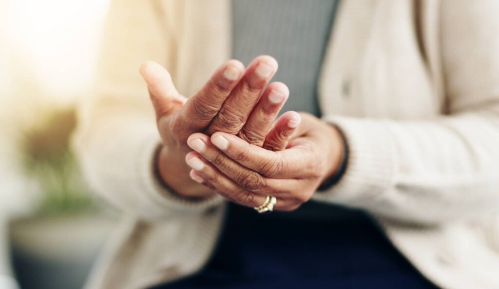A patient experiencing hand pain