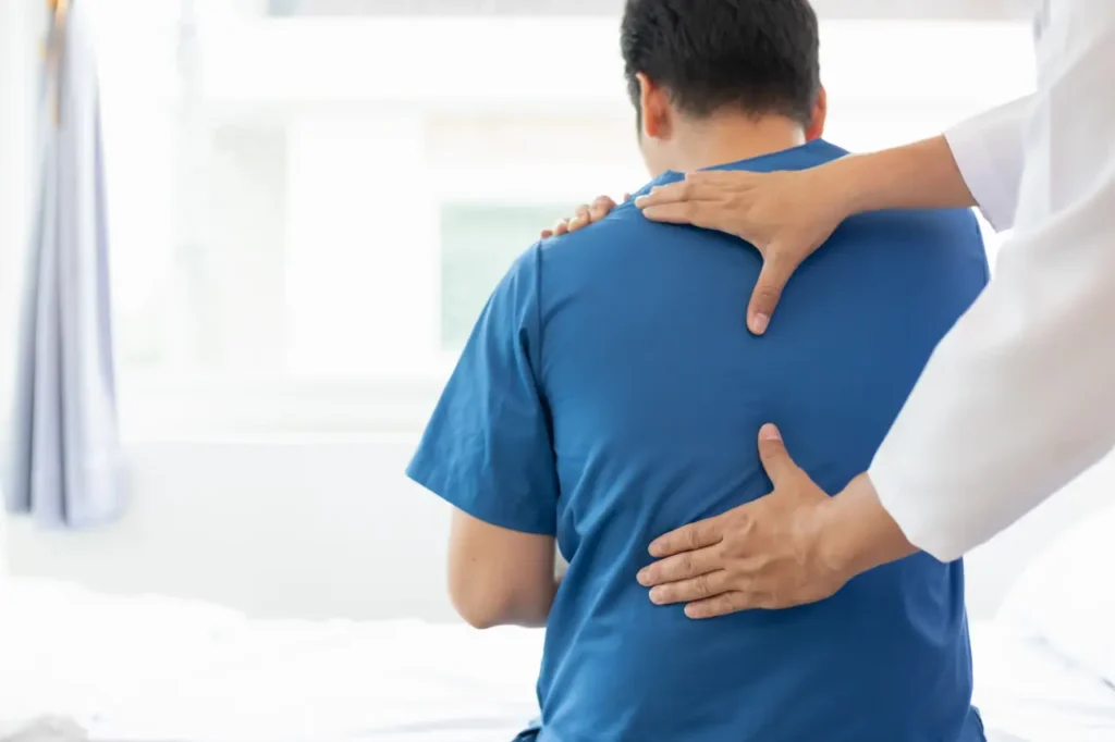 Rheumatologist evaluating inflammatory back pain